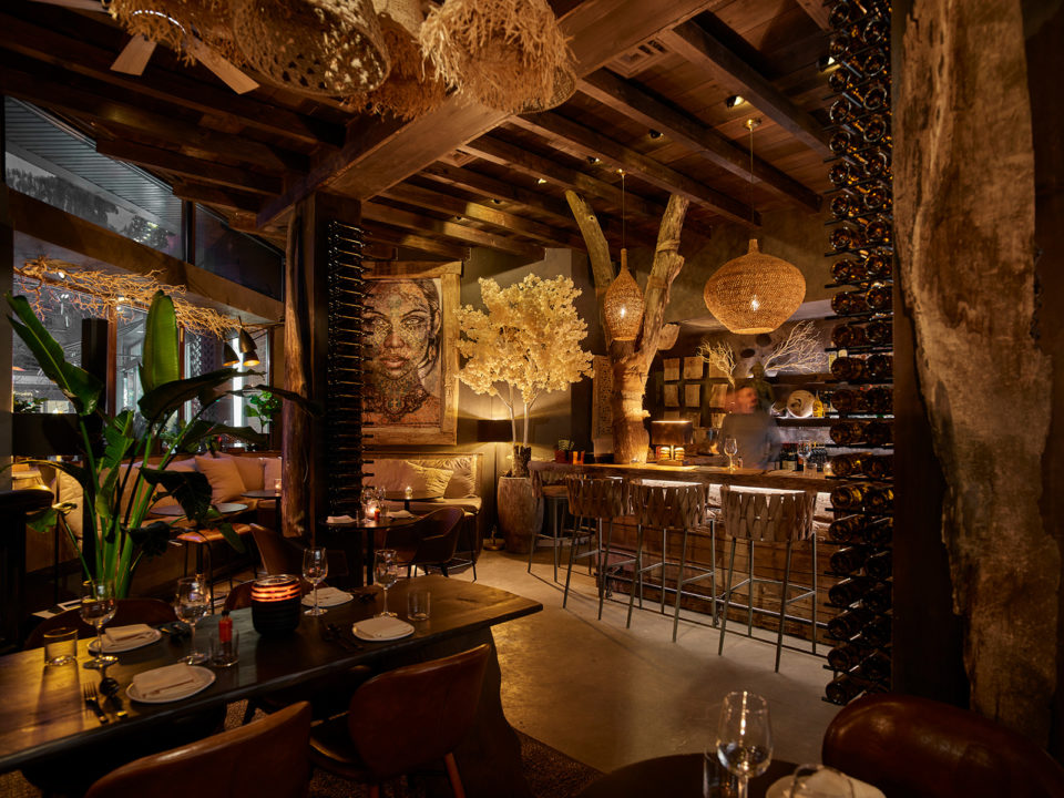 Warmly lit upscale restaurant interior in Aspen