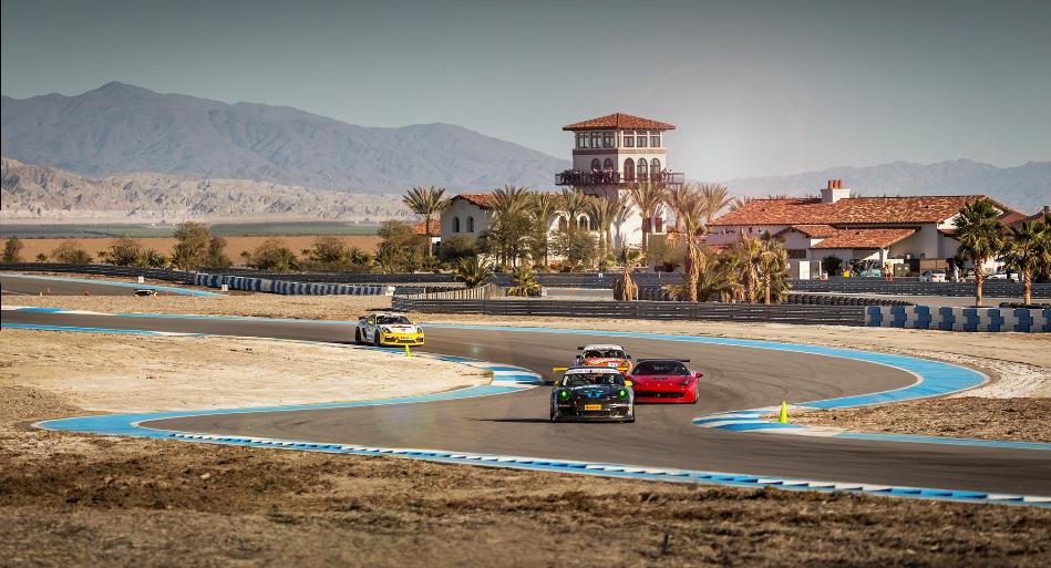 Sports cars on a private road-racing circuit at a desert country club
